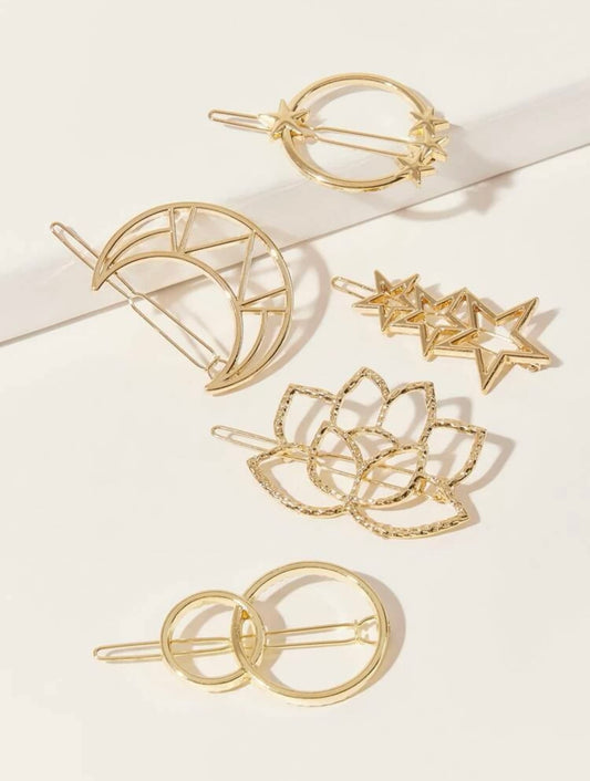 Gorgeous gold star, moon, and lotus hair clips